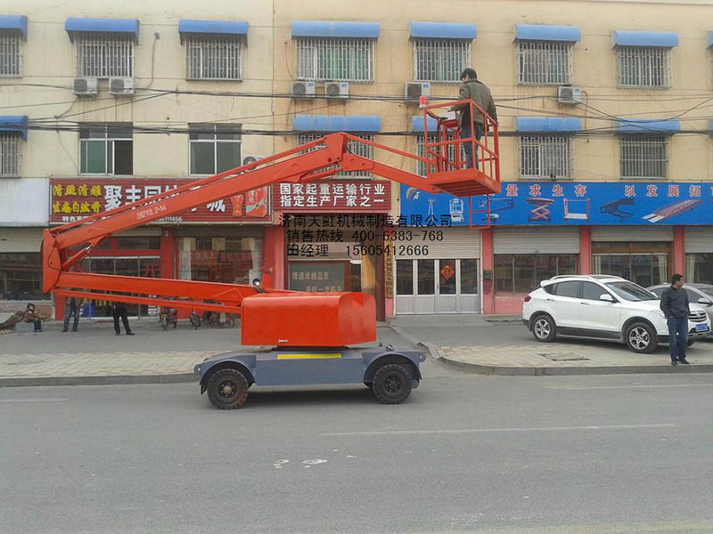 曲臂式汽車升降平臺(tái)